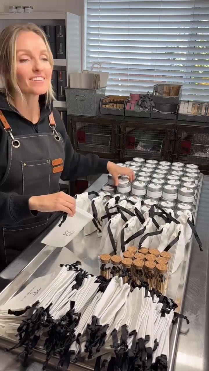 Finishing and packing candles by hand at the Sôlt studio